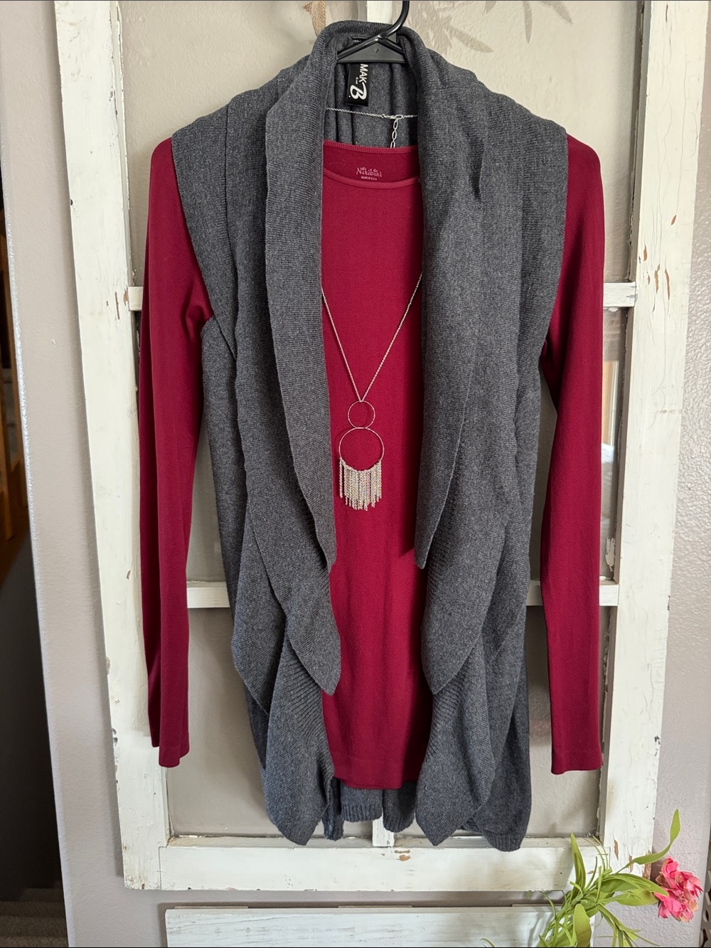 Stylish dark gray open front sweater vest